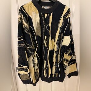 Like new Coogi sweater large. Excellent condition.
